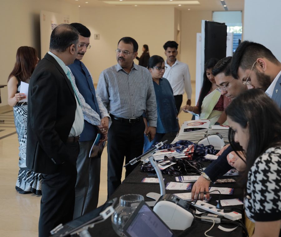 Delegates networking on the exhibition floor