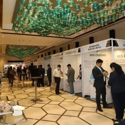 Branded exhibition stands lining the summit expo floor