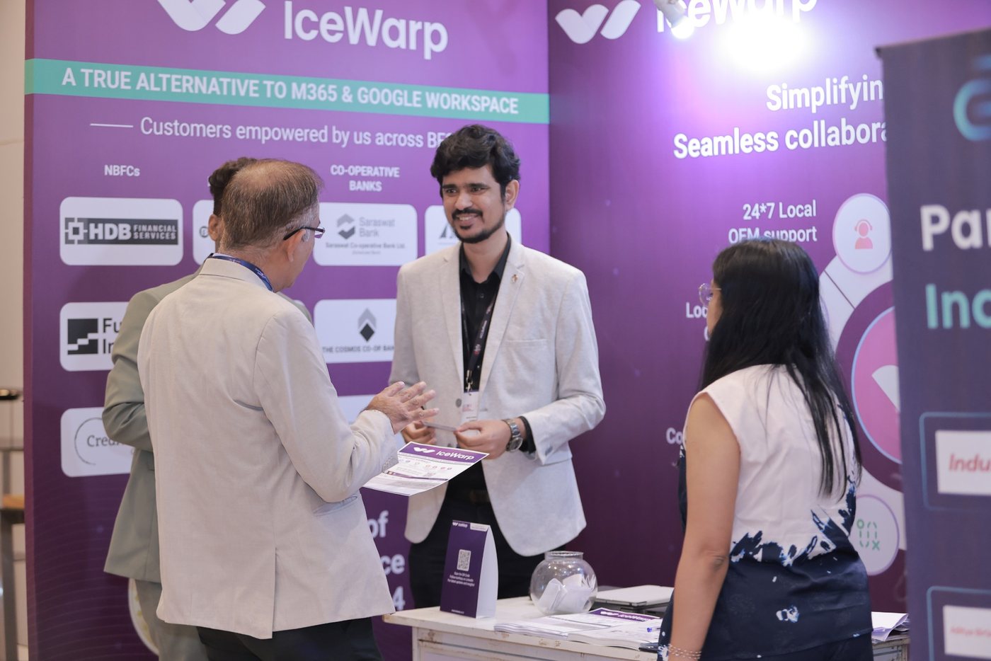 Delegates meeting on the exhibition floor