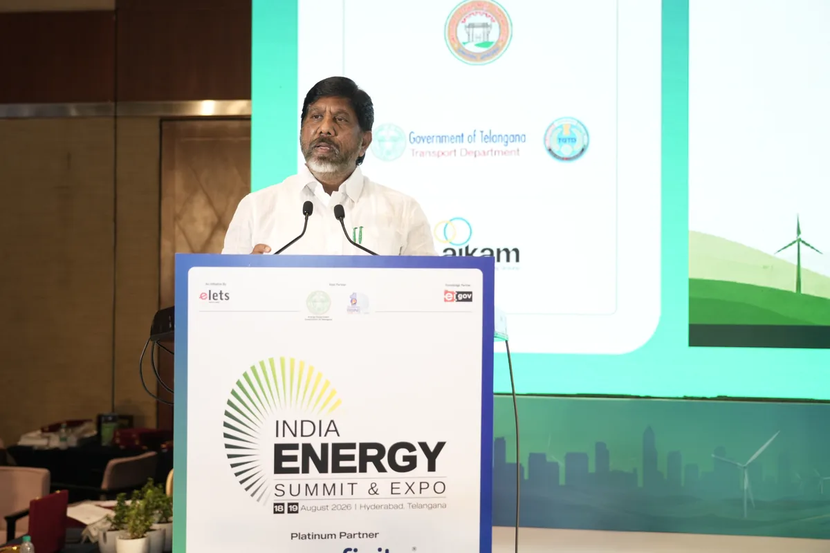 The chief guest addresses delegates from the India Energy Summit podium
