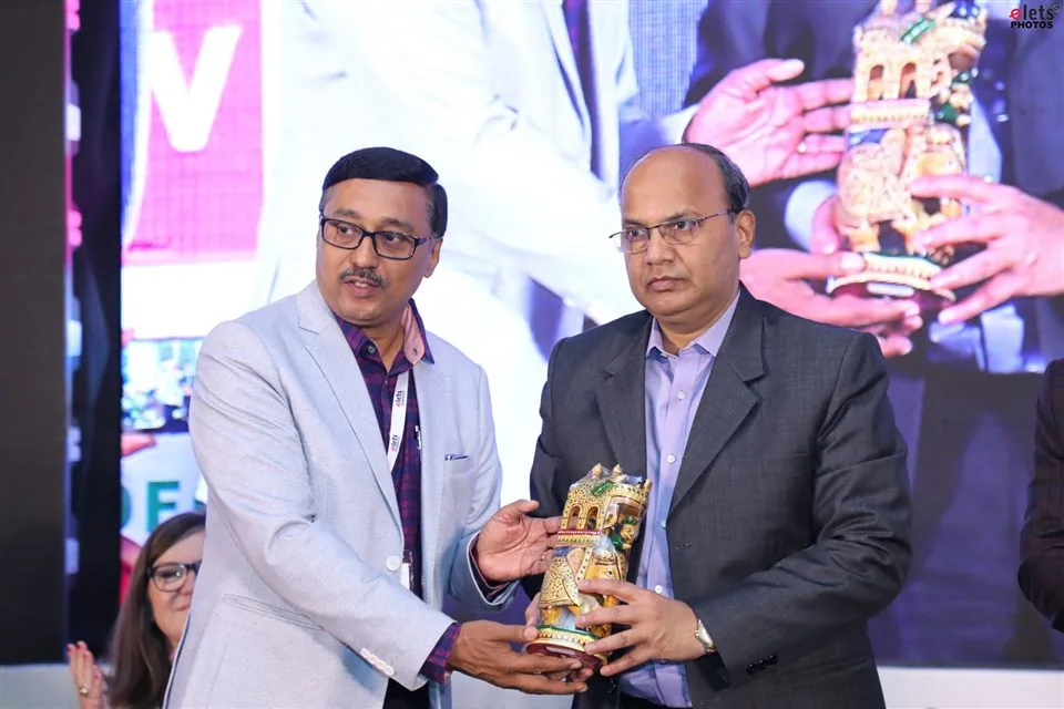 A commemorative memento presented on stage