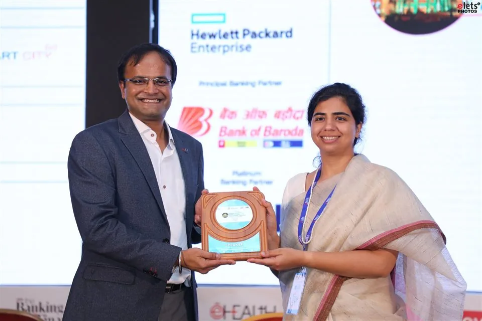 A plaque presented to a delegate on stage